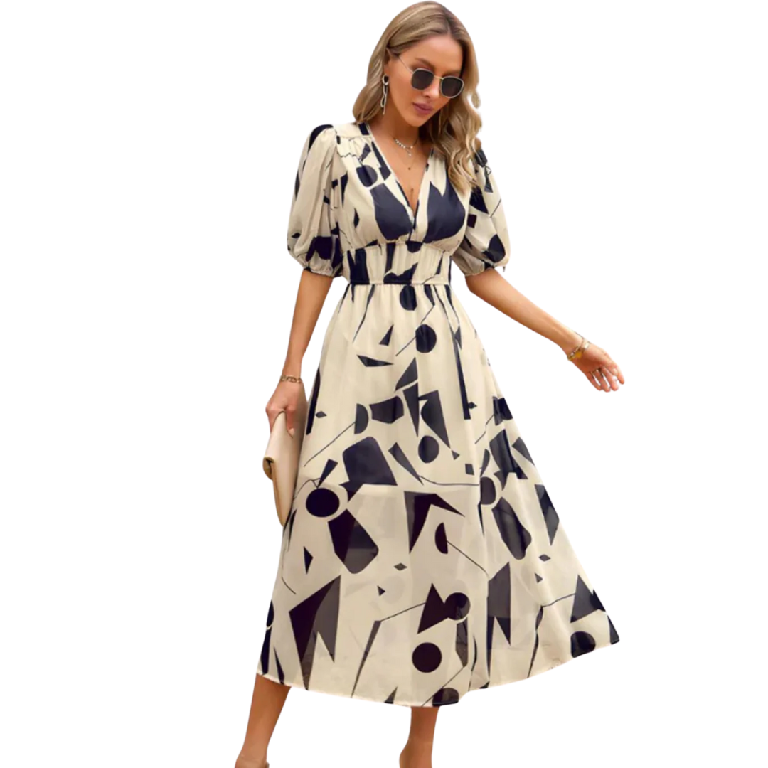 ABBY™ | VESTIDO ELEGANTE CON ESCOTE EN V Y MOTIVOS VIBRANTES